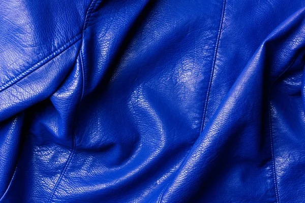 Top view of dark blue leather shiny textile as background — Stock Photo