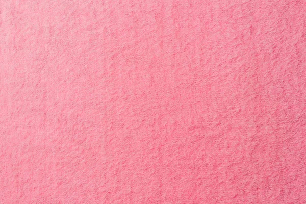 Vista elevada de rosa suave textil como fondo - foto de stock