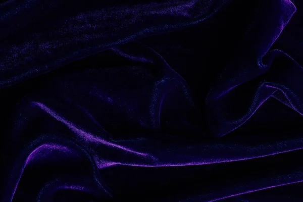 Vista superior del textil violeta oscuro como fondo - foto de stock