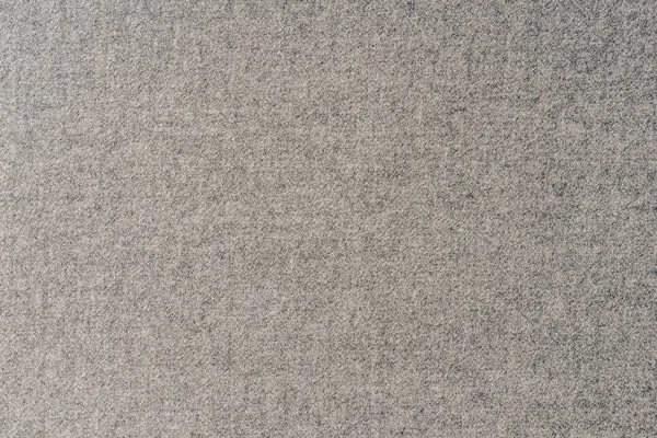 Vista superior de têxteis cinzentos como fundo — Fotografia de Stock