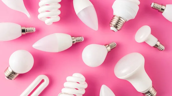 Top view of pattern from various light bulbs on pink — Stock Photo