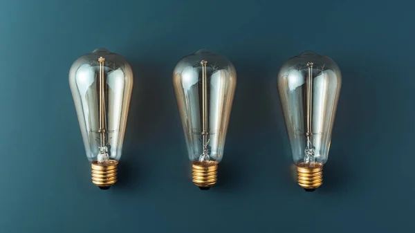 Primo piano delle lampadine sul grigio, concetto di energia — Foto stock