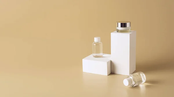 Close up view of micellar water in bottles and face cream in glass jar on white cubes on beige backdrop — Stock Photo