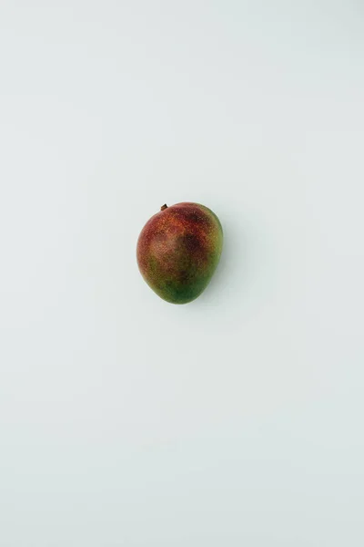 Top view of fresh juicy mango, on grey — Stock Photo