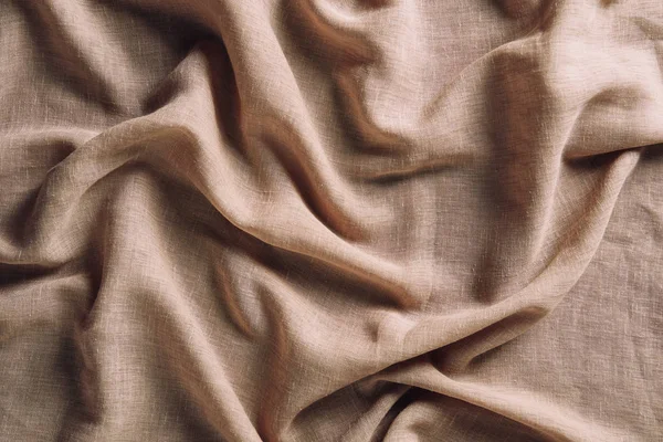 Top view of crumpled beige cloth for background — Stock Photo