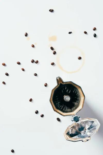 Top view of mocha pot on messy white surface — Stock Photo