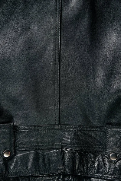 Quadro completo de jaqueta de couro preto como fundo — Fotografia de Stock