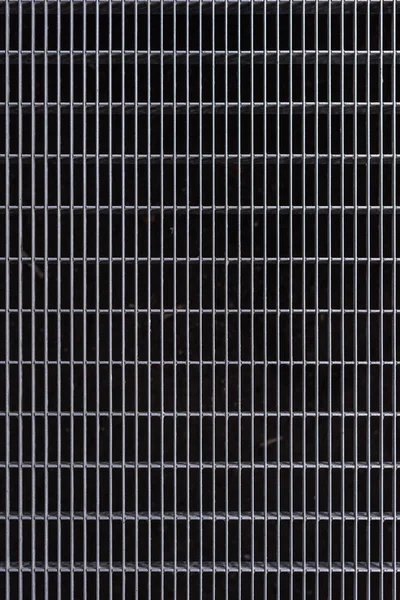 Full frame image of grey metal cage background — Stock Photo