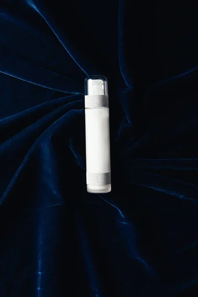 Top view of beauty lotion on velvet surface — Stock Photo