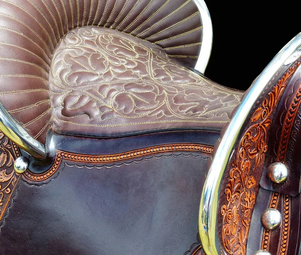 Element of the leather Peruvian Paso style saddle with beautiful carving design
