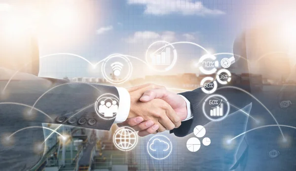 Double exposure of shaking hand business people for success deal with new icon on import or export transportation