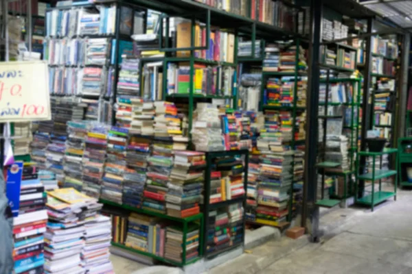 Blurred shelf in book store for background.  Concept business — Stock Photo, Image