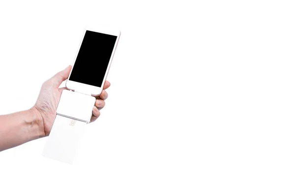孤立したクレジットカード機で手持ちスマートフォン — ストック写真