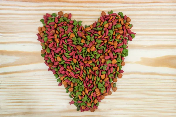Heart-shaped pet food.  Dry food for pets