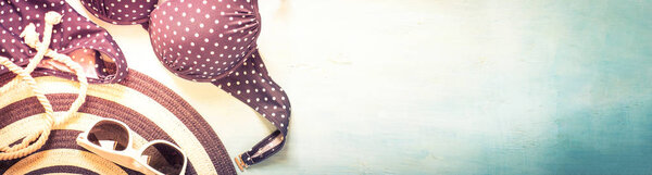 Summer background. Beach clothes set top view.