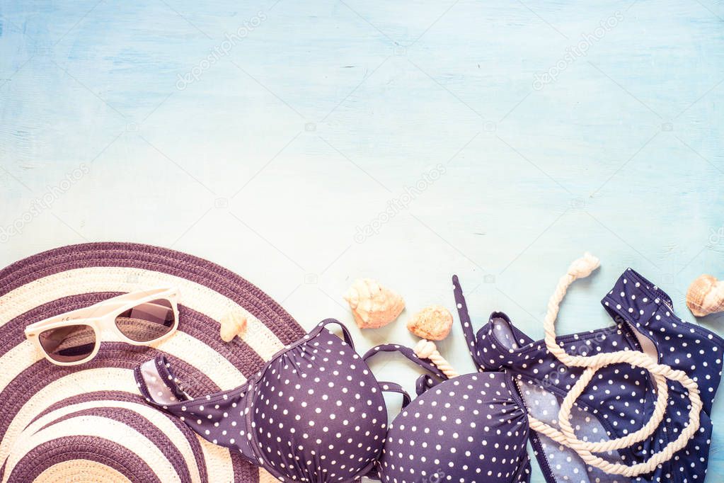 Summer background. Beach clothes set top view.