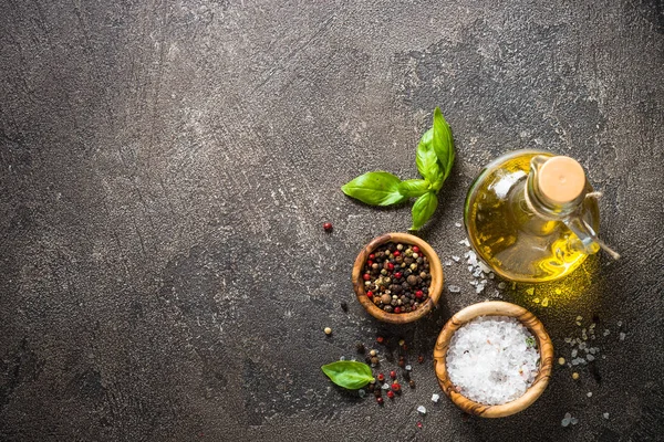 Spices, herbs, olive oil top view.