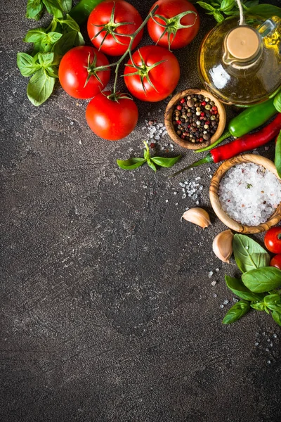 Spices, herbs, olive oil and vegetables top view. — Stock Photo, Image