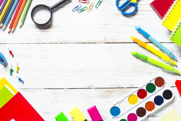 School and office supplies on white wooden table. — Stock Photo, Image