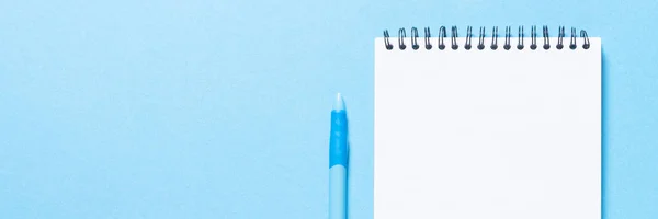 Notebook Pen Blue Background Top View Copy Space Long Banner — Stock Photo, Image