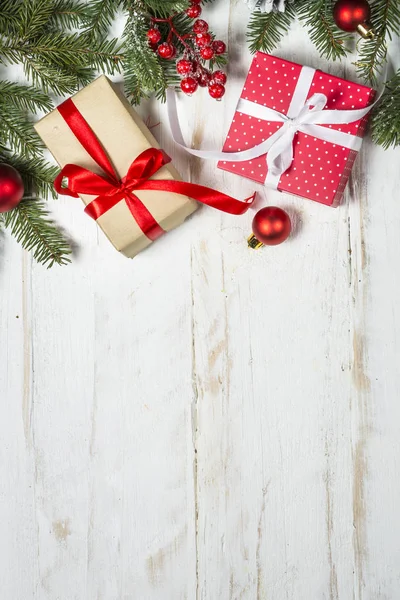 Christmas background with fir tree, present box and decorations — Stock Photo, Image