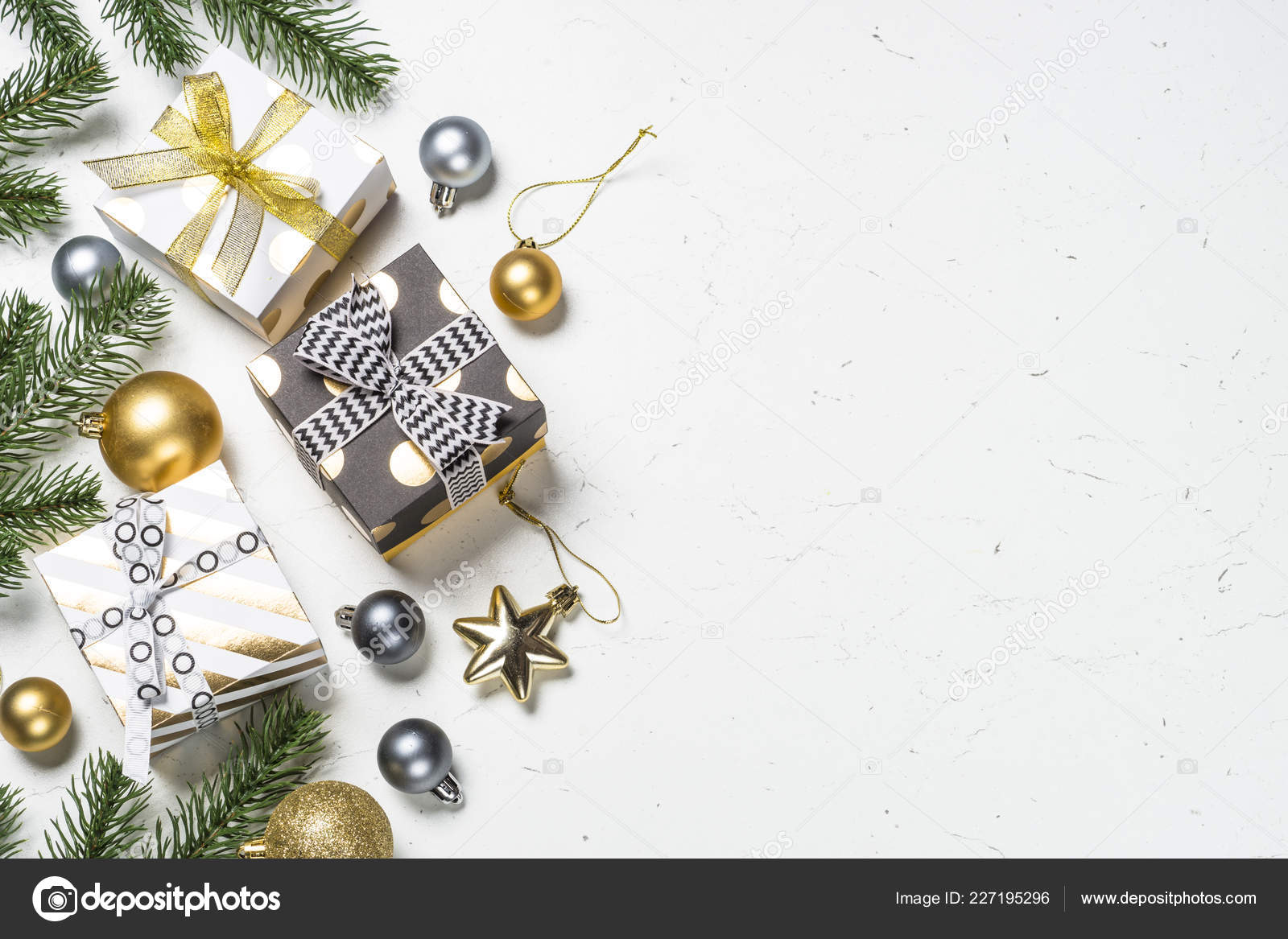 Christmas background with gold and silver decorations on black