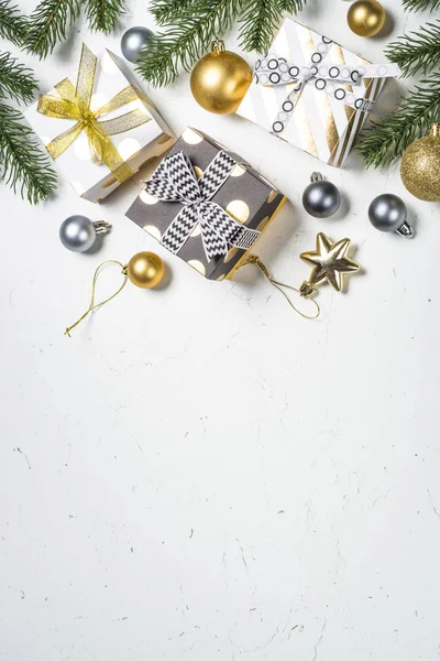 Christmas background - Gold and silver decorations and present b Stock  Photo by ©Nadianb 227963236