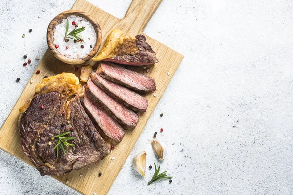 Grilled beef steak ribeye on white. — Stock Photo, Image