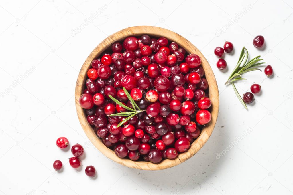 Cranberry in the bowl on white background.