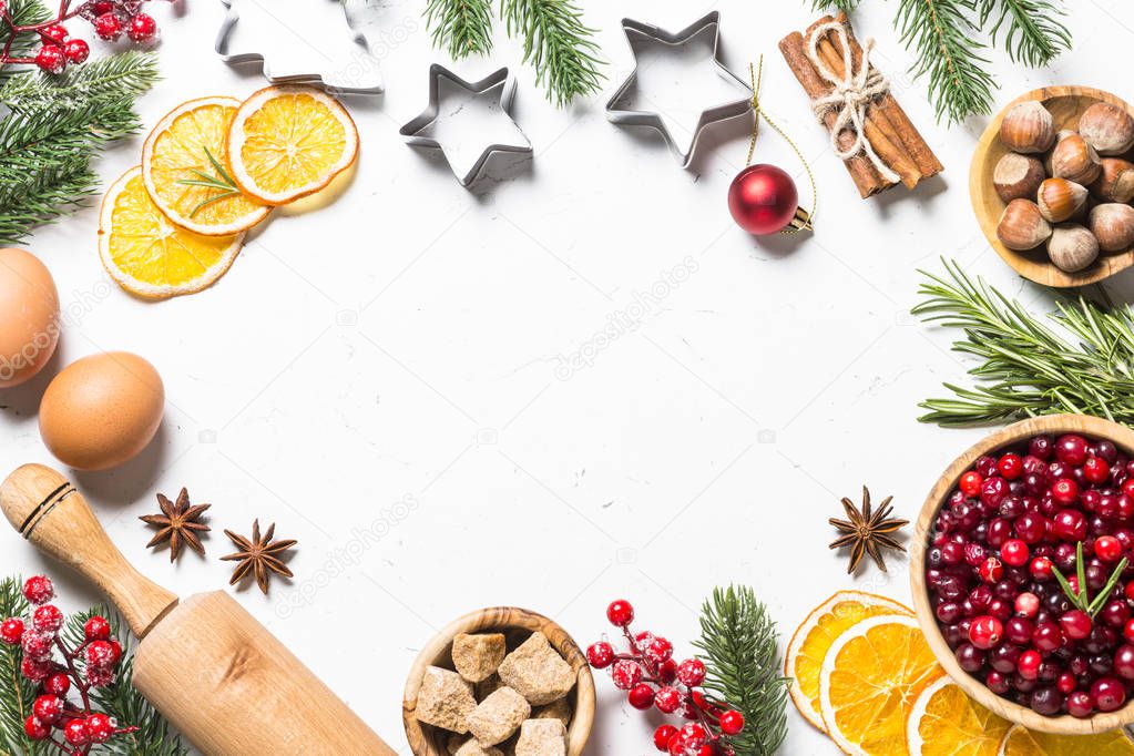 Christmas food baking background top view on white background.