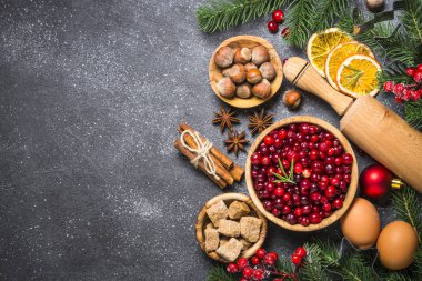 Noel yemek pişirme siyah arka plan üzerine arka plan üstten görünüm.