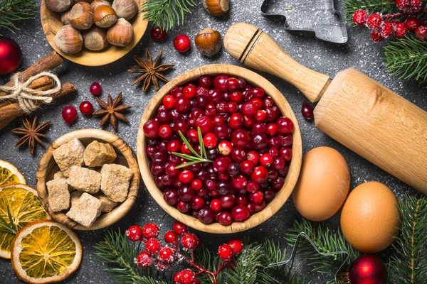 Christmas food baking background top view on black background. — Stock Photo, Image