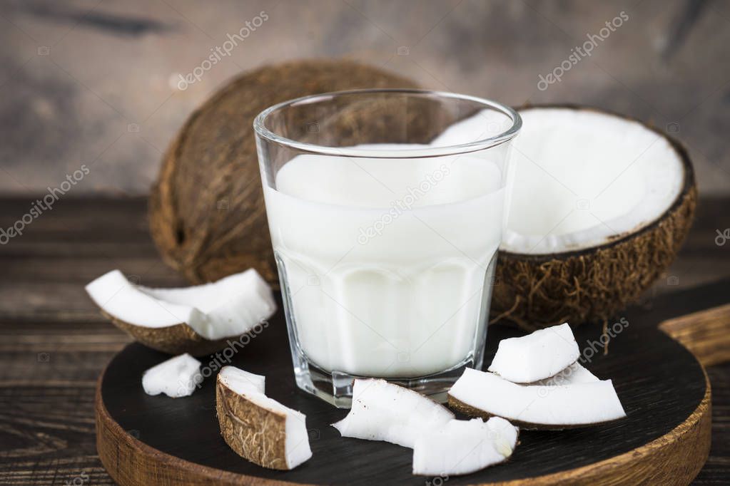 Coconut milk in glass, Vegan milk. 