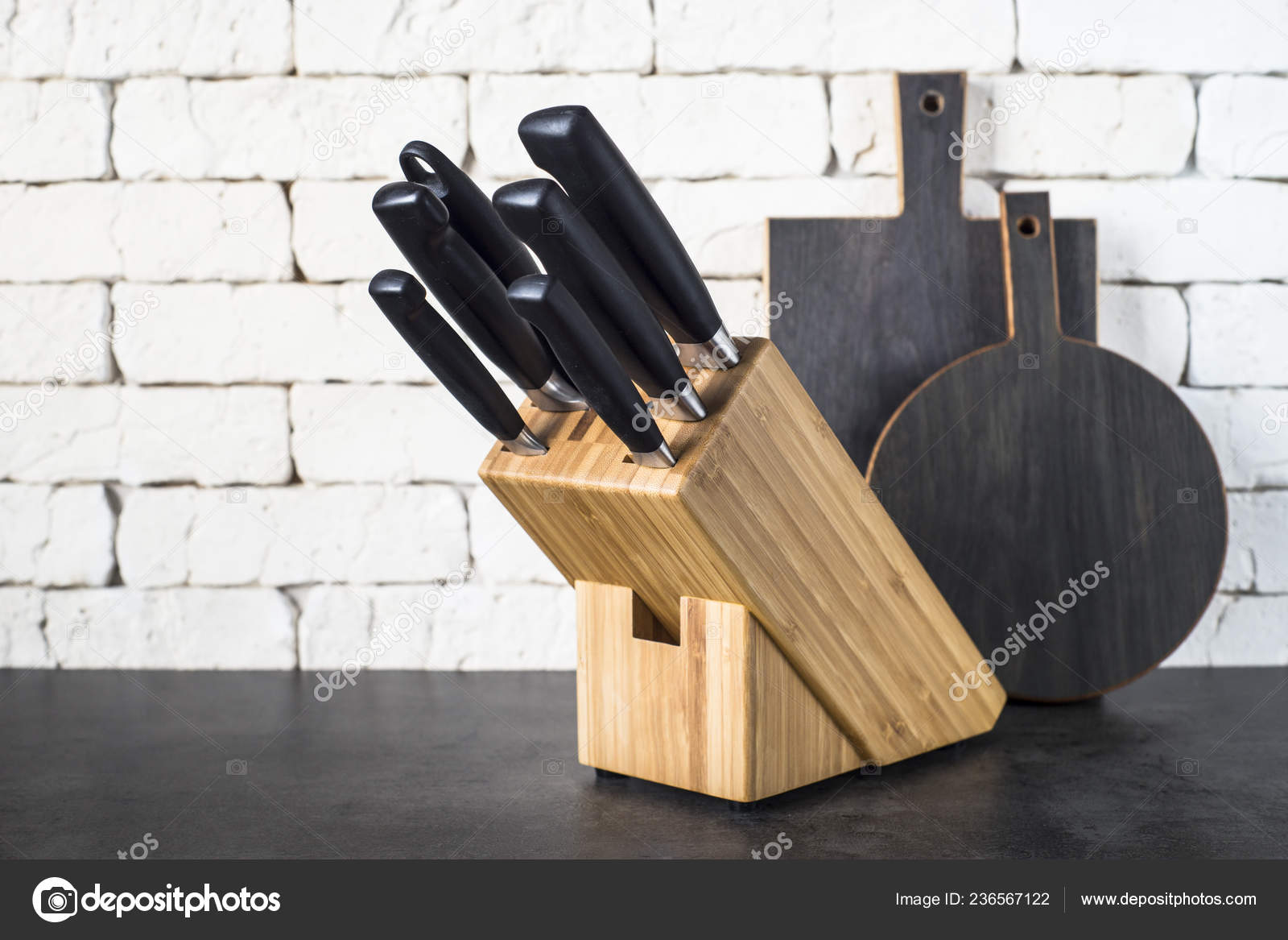 https://st4.depositphotos.com/1558912/23656/i/1600/depositphotos_236567122-stock-photo-knife-block-on-the-kitchen.jpg