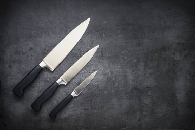 Knife set on the table. clipart