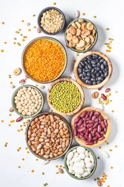 Legumes, lentils, chikpea and beans assortment on white. — Stock Photo, Image