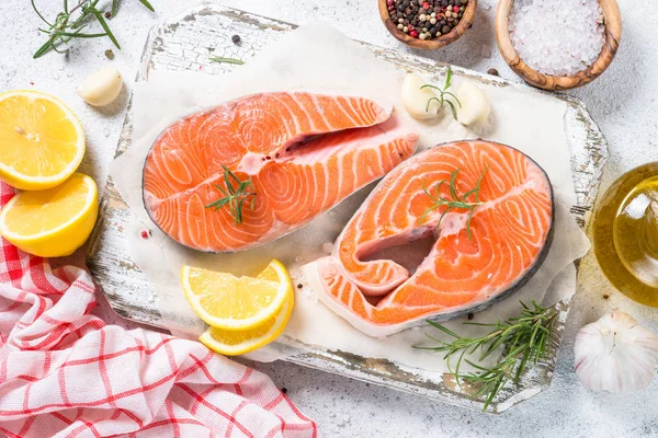 Salmon steak fresh fish with spices top view. — Stock Photo, Image