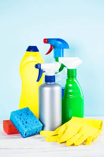 Cleaning product, household on blue background.