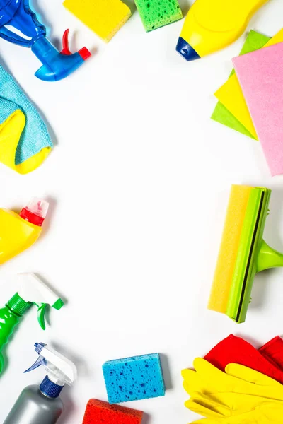 Cleaning product, household, sanitary supplies on white background. Top view with copy space.