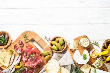 Antipasto delicatessen - meat, cheese and olives. clipart