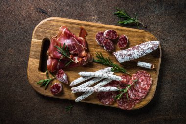 Antipasto - sliced meat, ham, salami top view.