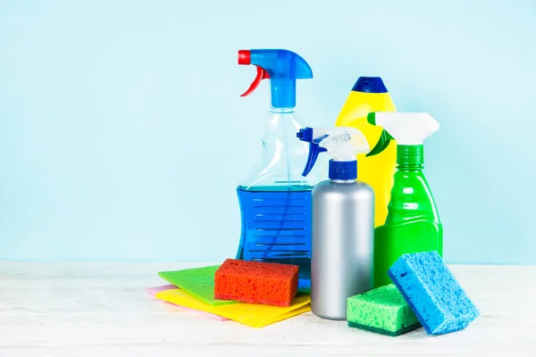 Cleaning product, household on blue background.