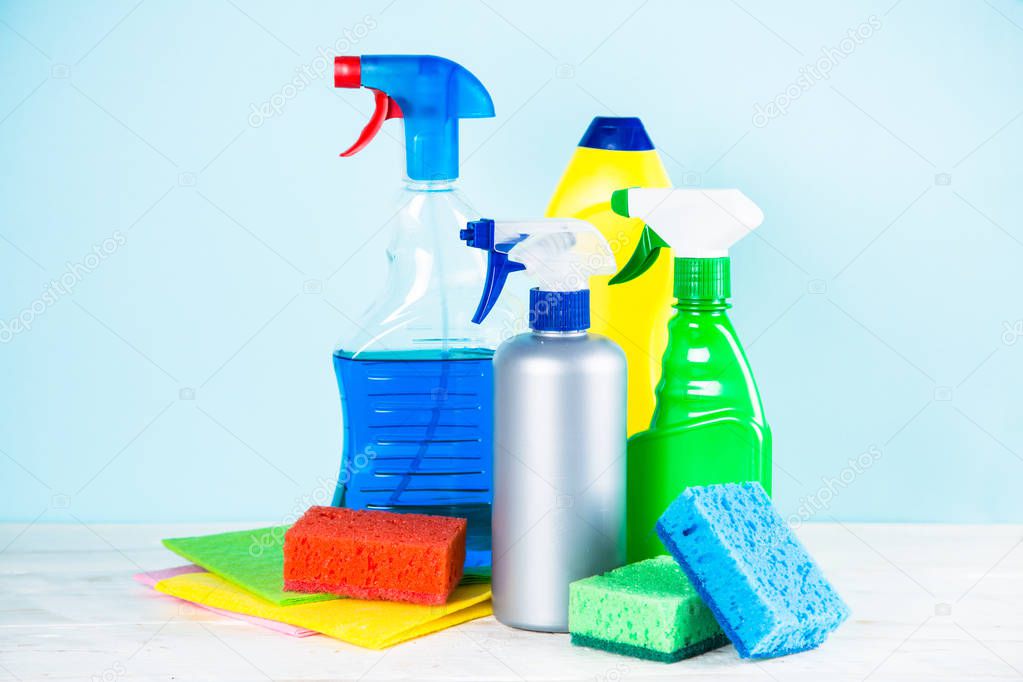 Cleaning product, household on blue background.