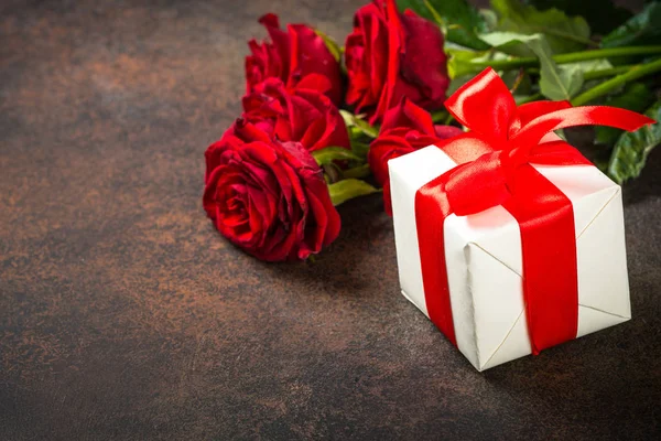 Holiday background with present and flower.