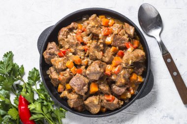 Beef stew with vegetables. clipart