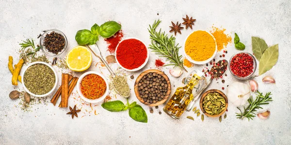 Set of various spices and herbs top view.