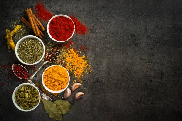 Set of various spices on black background. — Stock Photo, Image