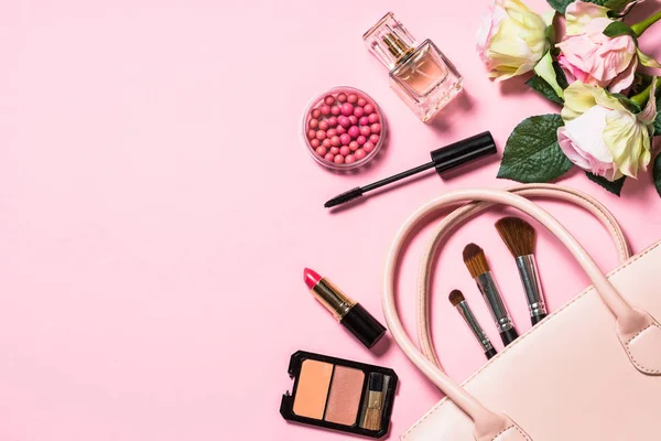 stock image Woman flat lay makup background with cosmetics on pink.