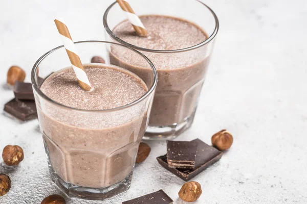 Chocolate coconut hazelnut milkshake or smoothie top view. — Stock Photo, Image