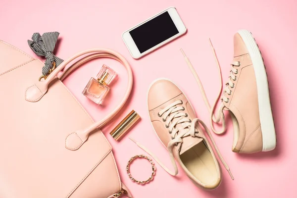 Woman flat lay background on pink. — Stock Photo, Image